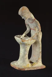 Statuette of a woman rolling pastry, from Tanagra, Boeotia